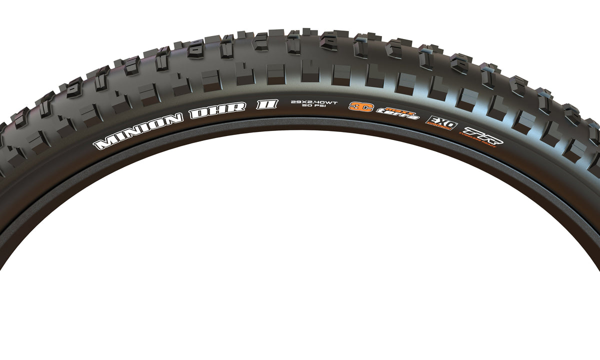 Maxxis Minion DHR II black tyre sidewall and tread detail on a white background