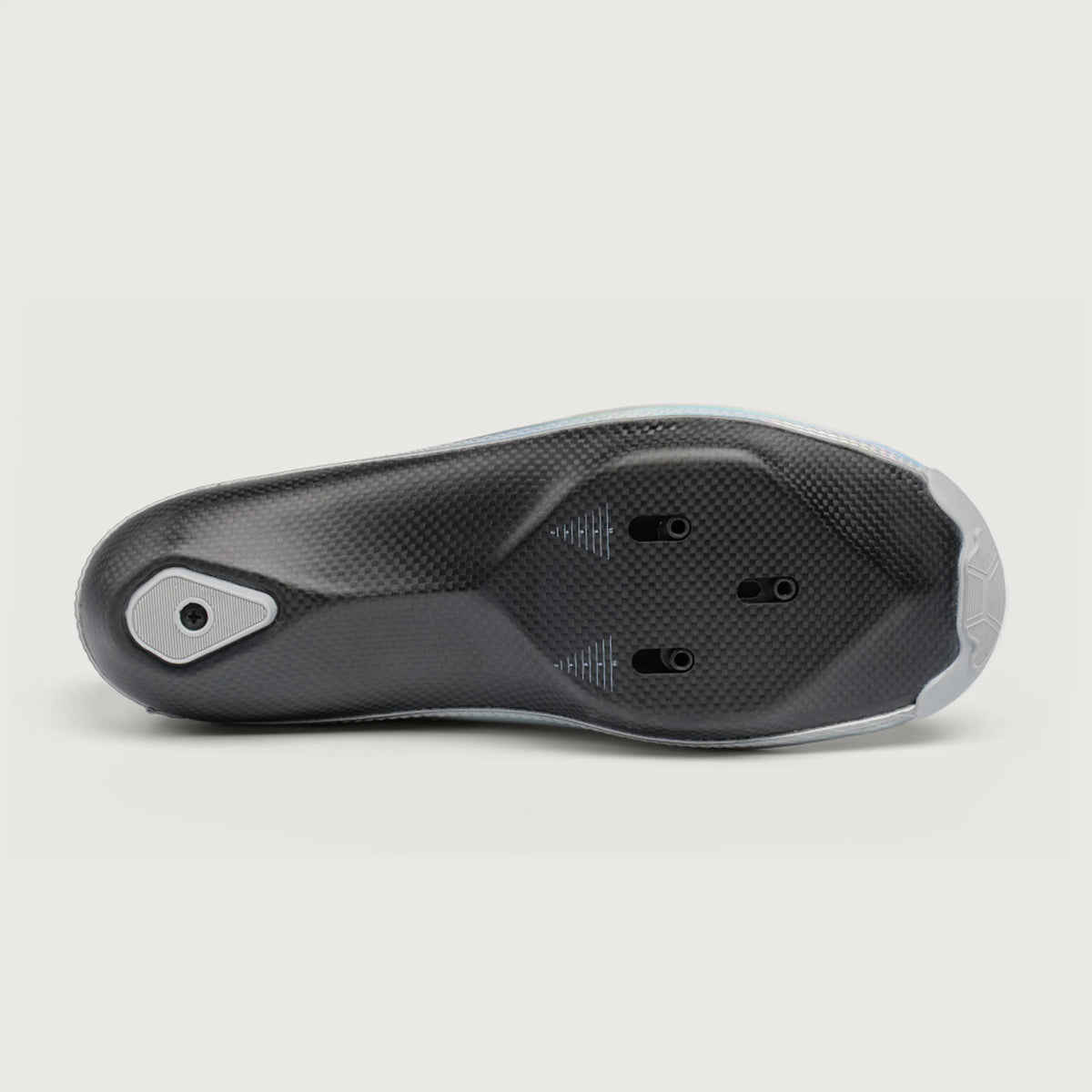 Underside of the Étoile shoe showing the carbon chassis and cleat mounting area