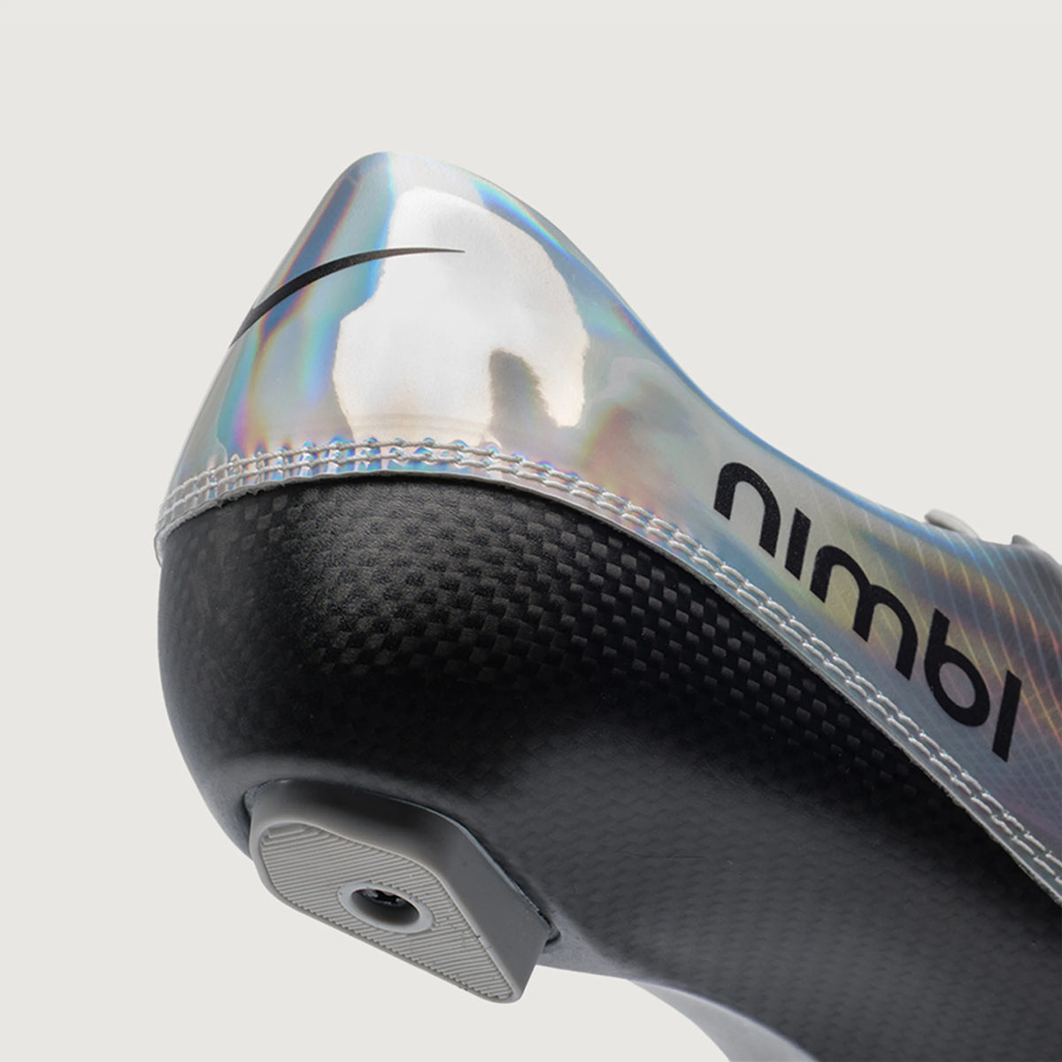 Close view of the iridescent heel and carbon construction
