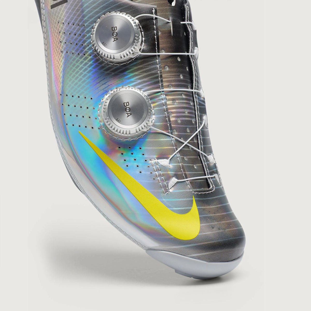 Close view of the upper, BOA dials and yellow Nike Swoosh