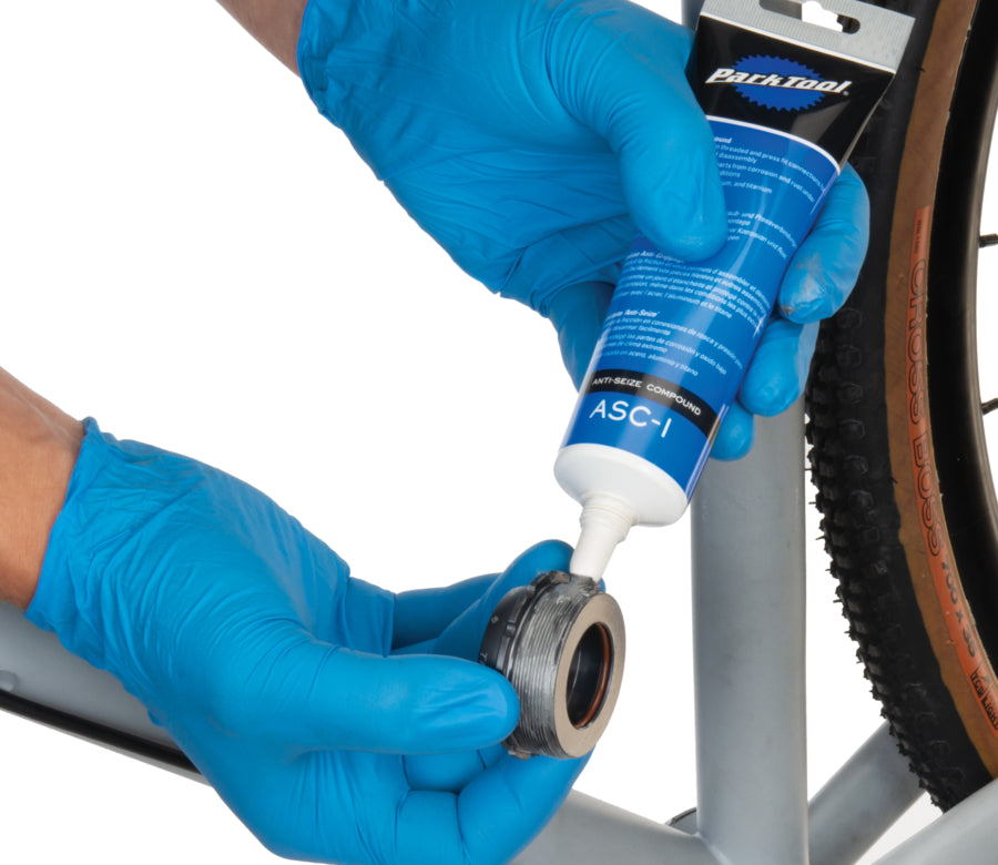 Applying Park Tool ASC-1 Anti-Seize Compound to bottom bracket threads